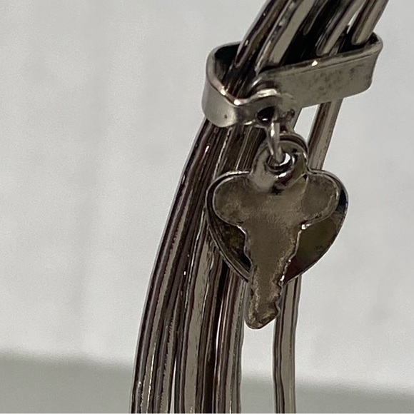 Seven silver tone attached bangle brackets. Used - Picture 3 of 6